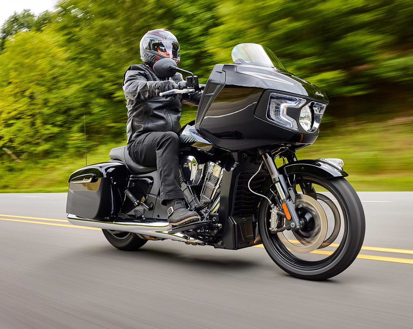 2024 Indian Challenger riding on country highway