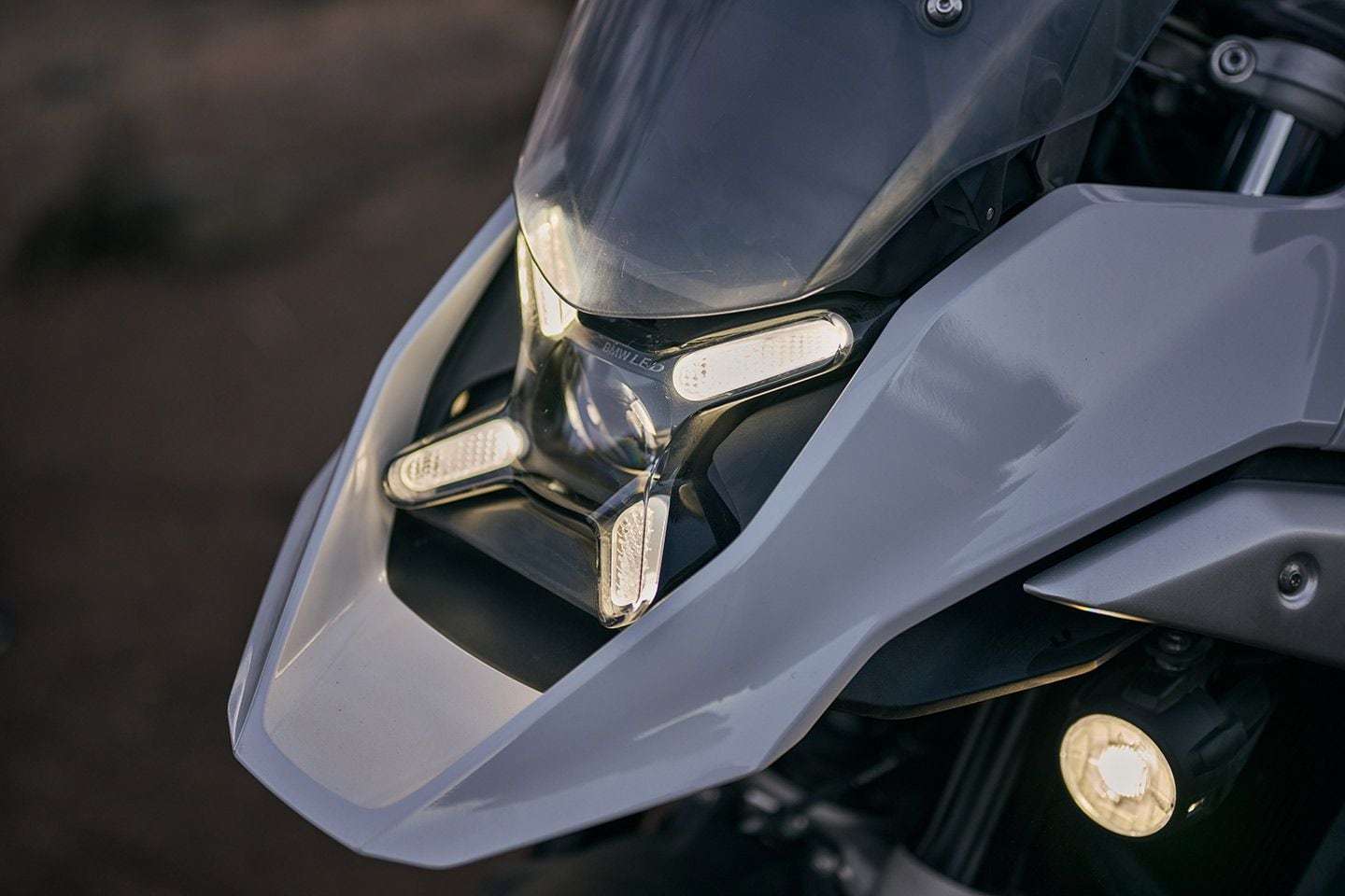 BMW’s R 1300 GS gets a new LED headlight that integrates the high and low beams into a single unit.