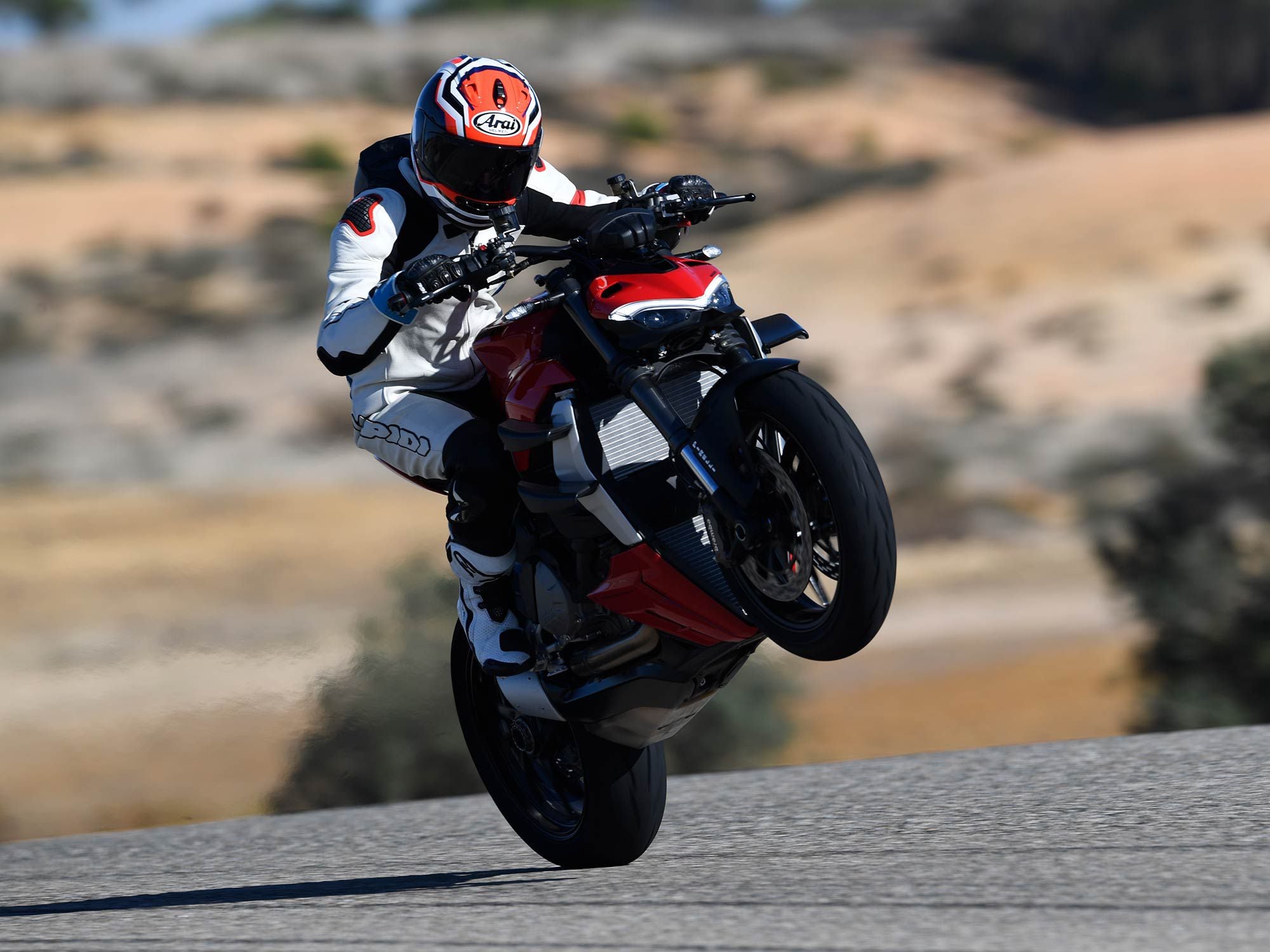 True to the Streetfighter badging, the V2 easily lofts the front tire tread skyward.