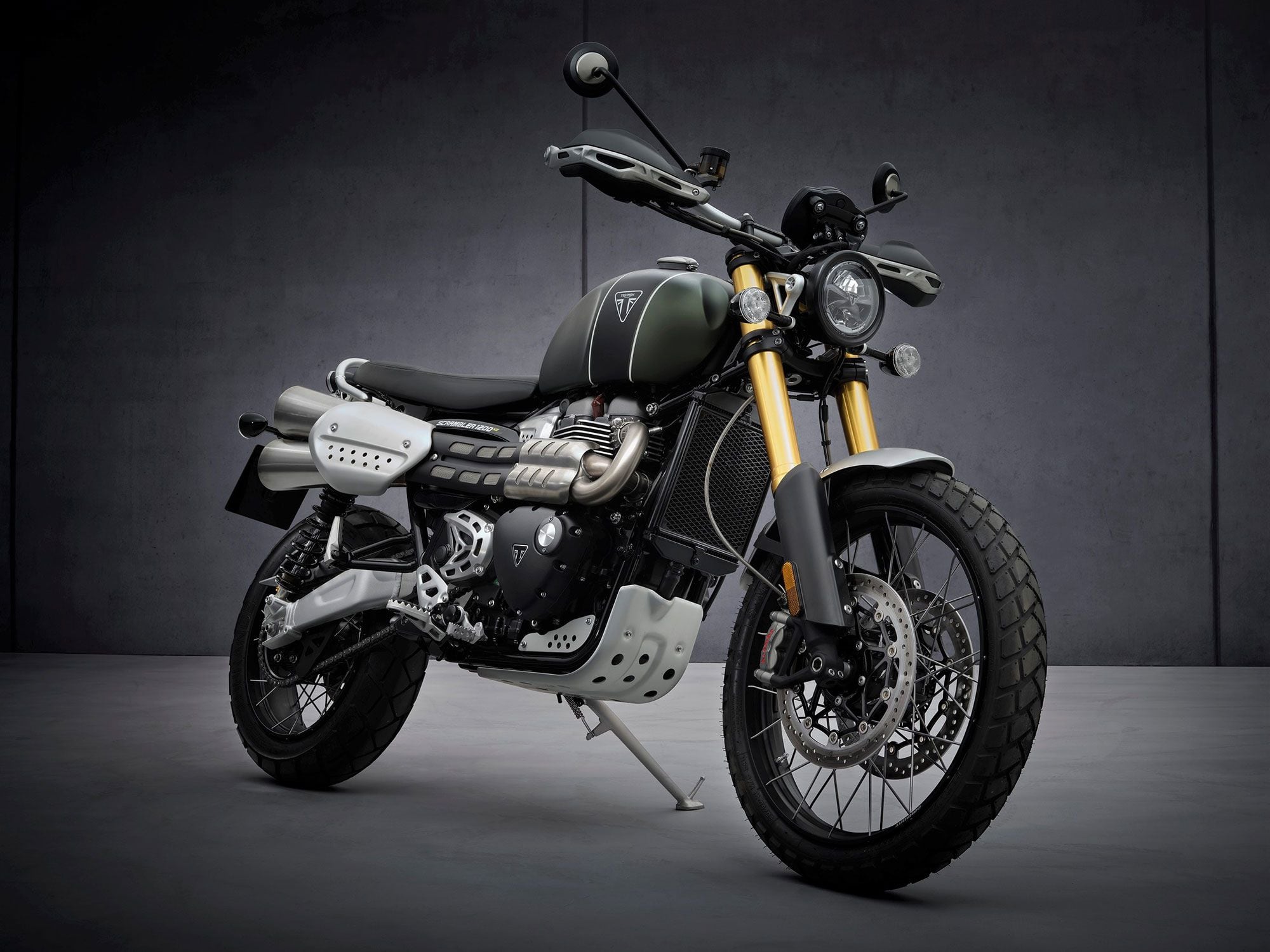 The 2022 Scrambler 1200 XE ups the spec level with longer-travel suspension, additional ride modes, and a higher price tag than the XC.