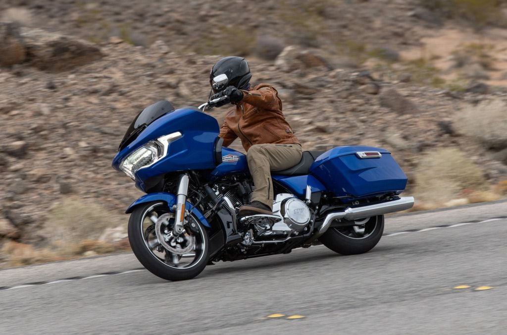 The Road Glide’s handlebar changes the seating position a bit with a similar leg bend, but places your arms much higher with the tall bars.