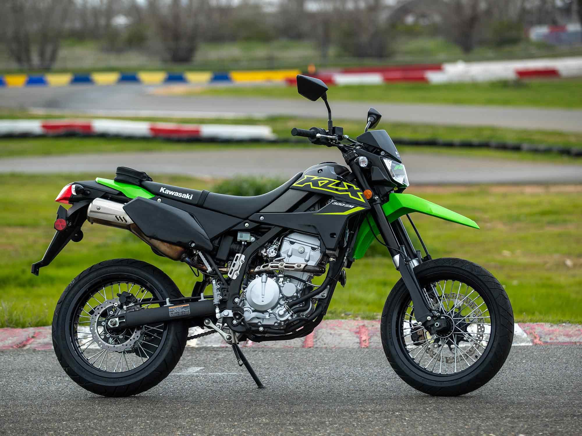 Supermoto-sized 17-inch wheels, shorter suspension, and a larger front brake differentiate the KLX300SM from its dual sport sibling.