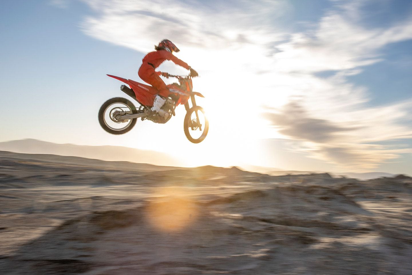 Small bike, big air. The extremely narrow waistline and familiar, moto-like riding position of the 250F provides a sense of comfort when arcing across the desert sky.