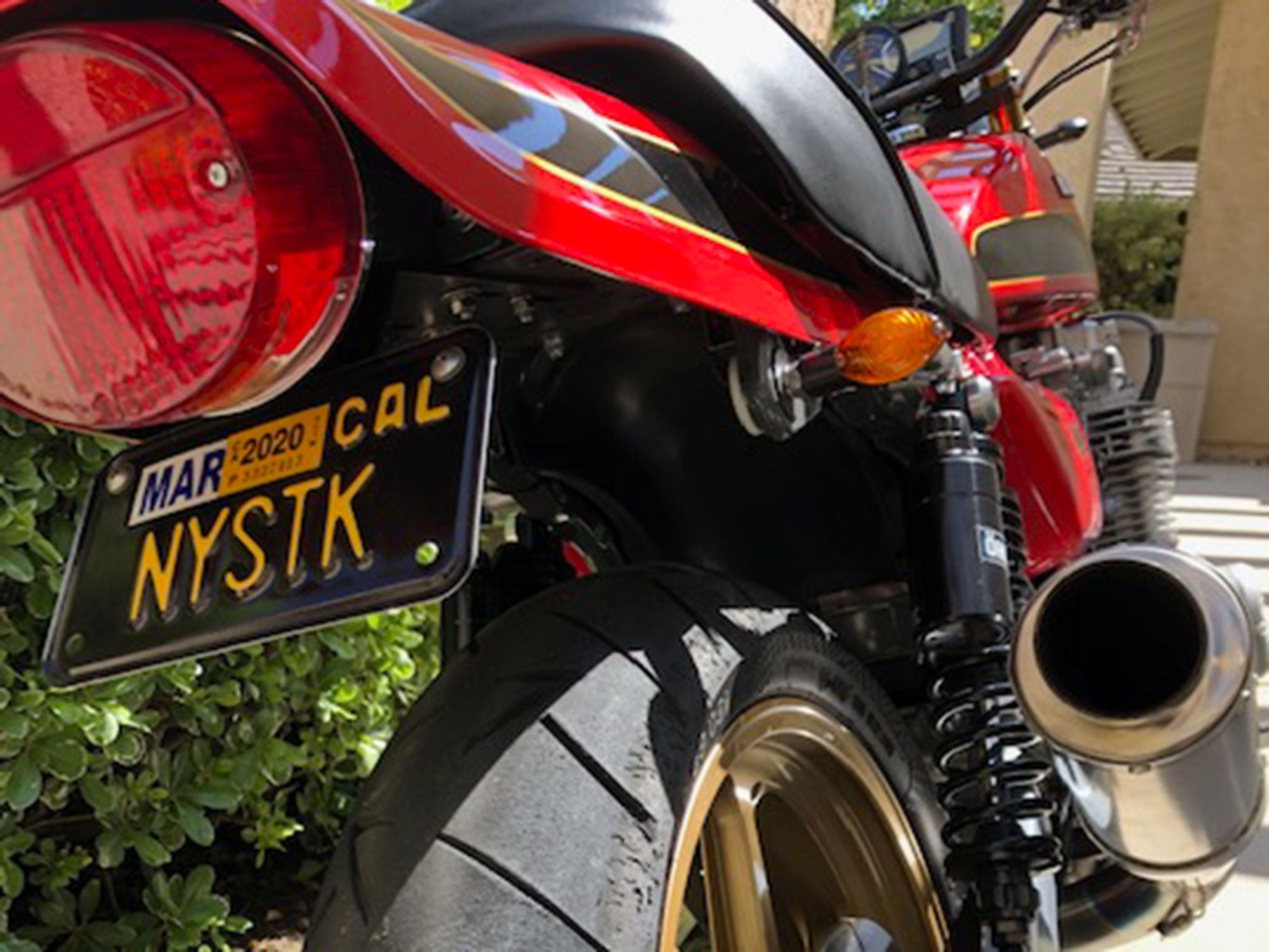 The meaning behind Evan’s “New York steak” license plate? During development of Kawasaki’s 1973 Z1 (900cc)—at a time when Kawasaki was taking direct aim at industry-leader Honda—the Japanese asked, “What is the best thing on an American menu?” “New York steak,” the American Kawasaki management told them, and that became the preproduction code name for the Z1, which became the KZ1000.