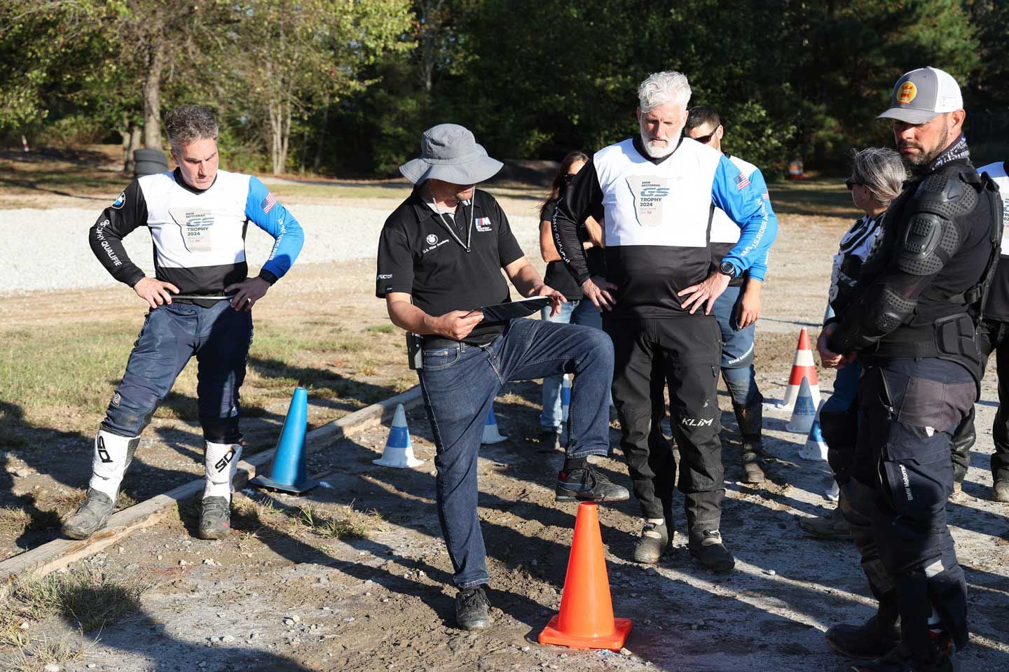 Ricardo Rodriguez, lead instructor at the Performance Center, walks finalists through the course. For this portion of the final, riders must execute a trials stop, rest their foot on the cone, and remain motionless for three seconds.