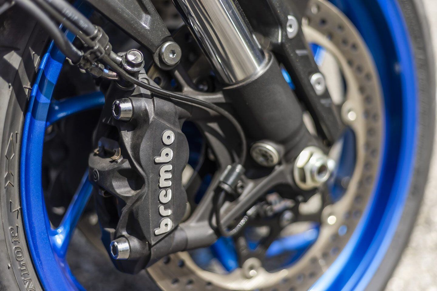 Brembo four-piston brakes are used up front.