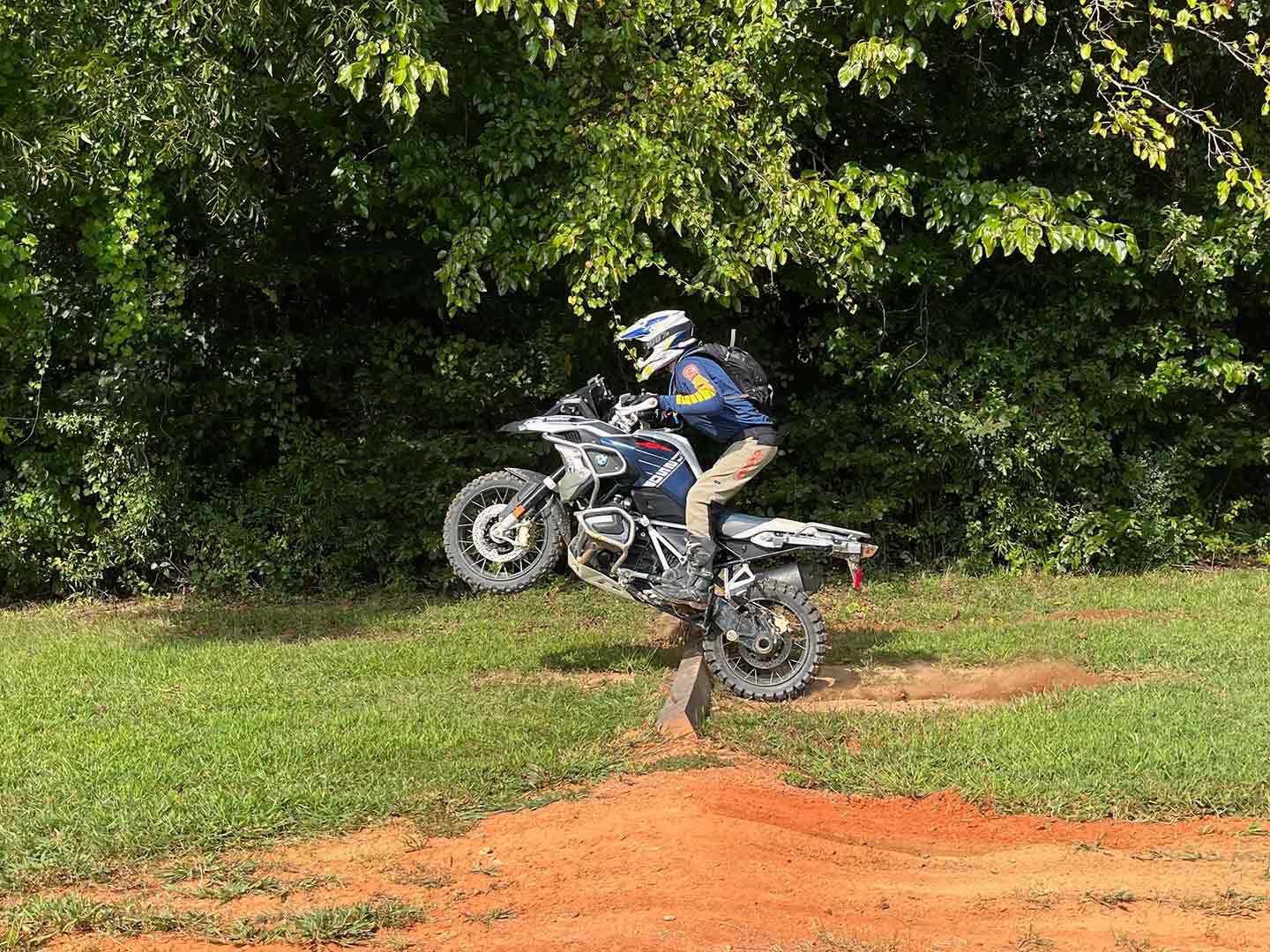 Lofting the front wheel over an obstacle at the BMW Performance Center.