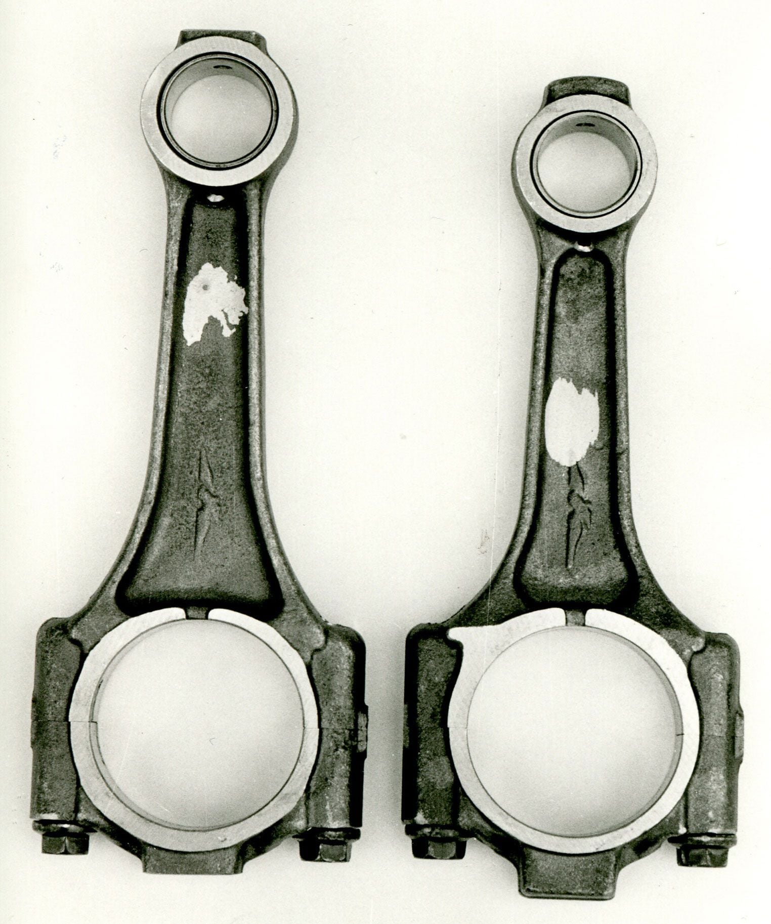 A longer V75 connecting rod (left) next to a V65 rod.