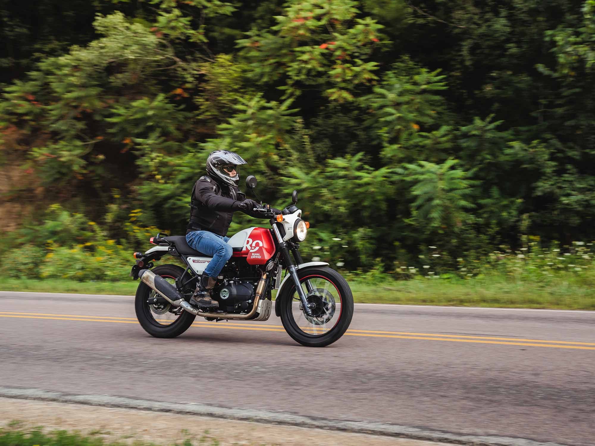 Less weight, lower bars, and a smaller front wheel make the Scram easier to maneuver than the Himalayan. At 5-foot-7, the author has plenty of room in the cockpit and an easy reach to the controls.