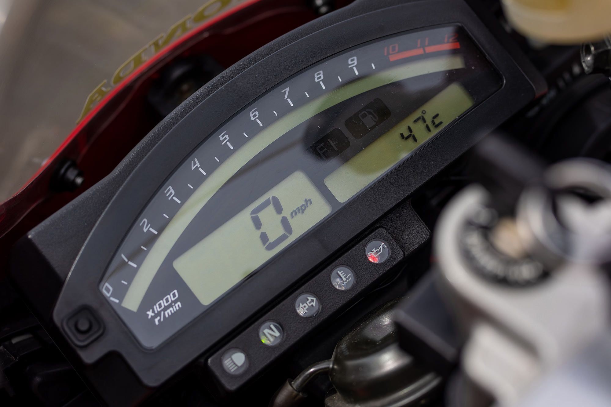 On the RC51, a digital rev counter dominates the simple, uncomplicated dash.