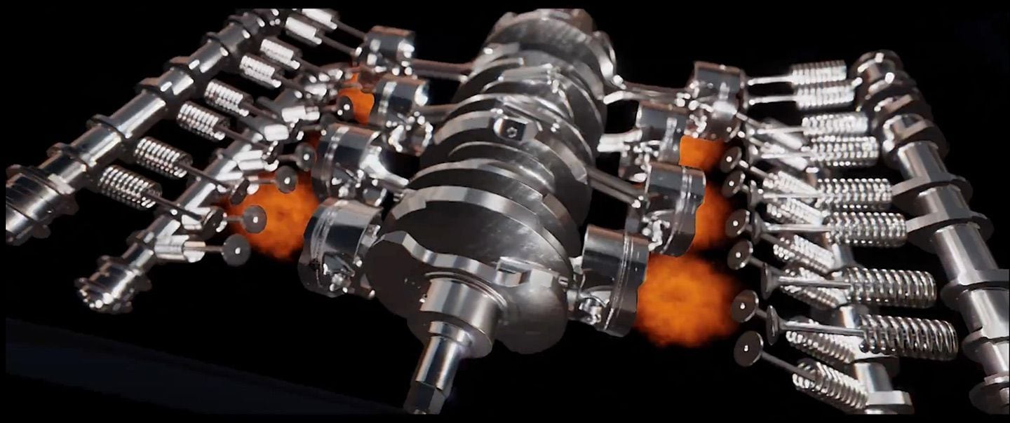This image shows how the internal engine components are arranged, and reveals the DOHC design and separate crankpins for each piston and rod.