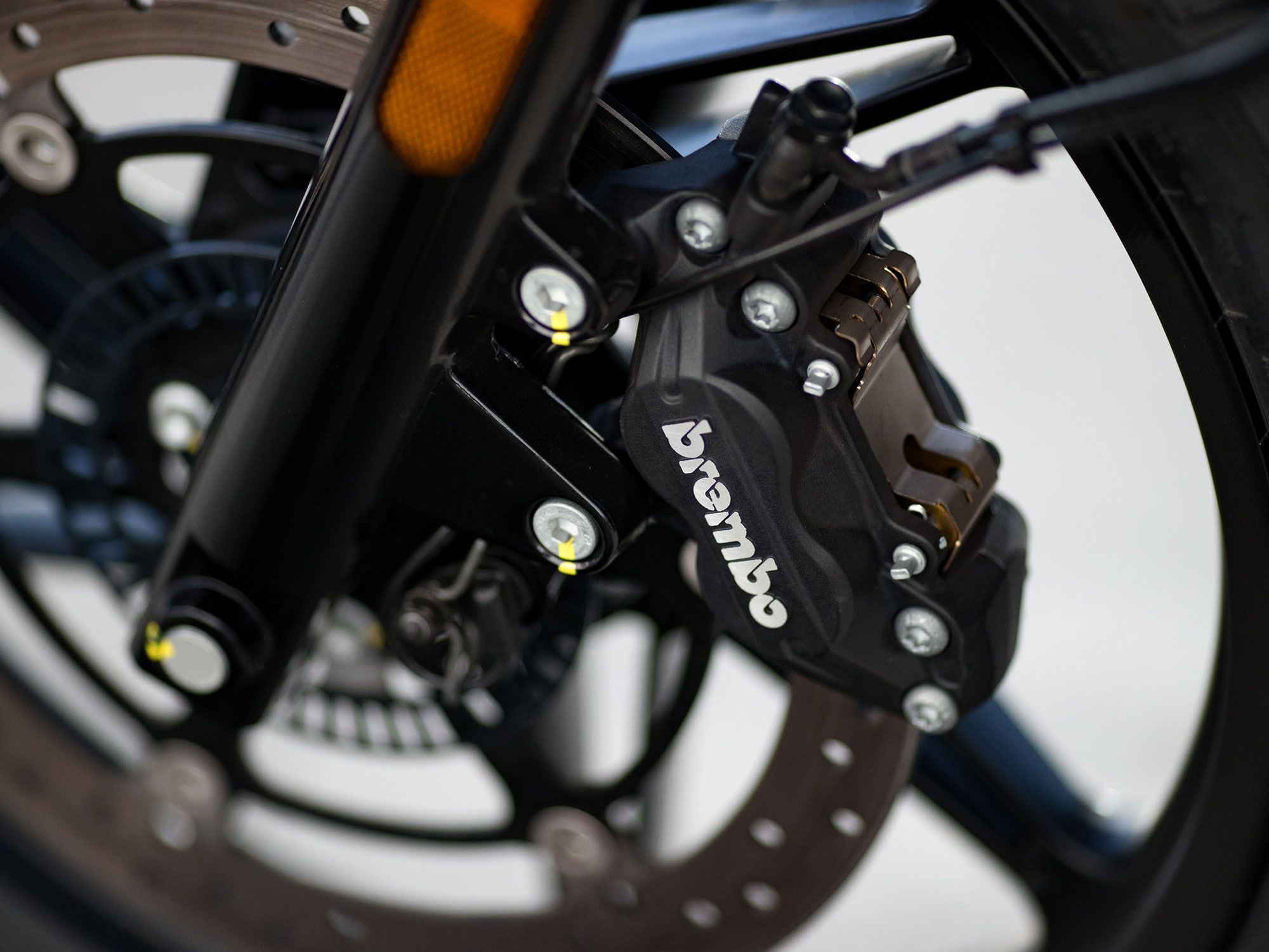 Brembo four-piston calipers provide excellent stopping power up front.