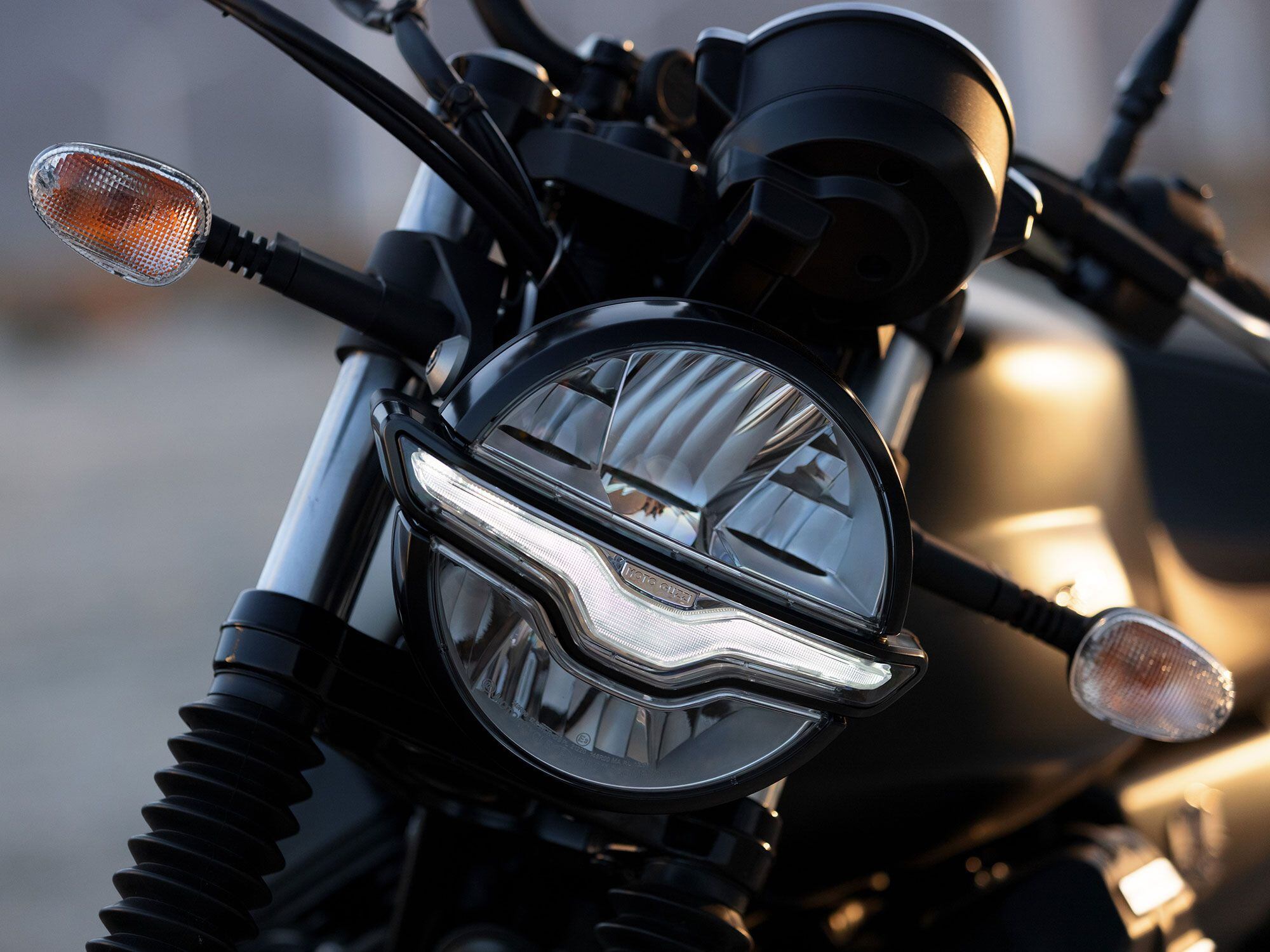 Subtle Moto Guzzi branding hides throughout the bike, like the eagle silhouette that serves as a daytime running light.