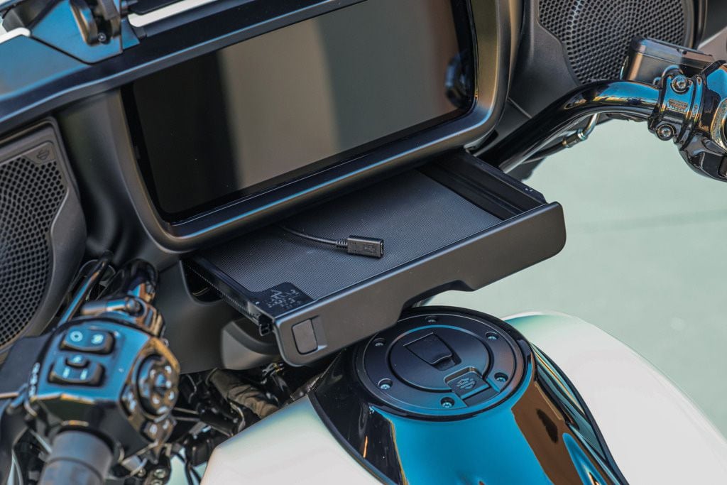 We love the Street Glide’s USB-C-equipped pop-out smartphone compartment.