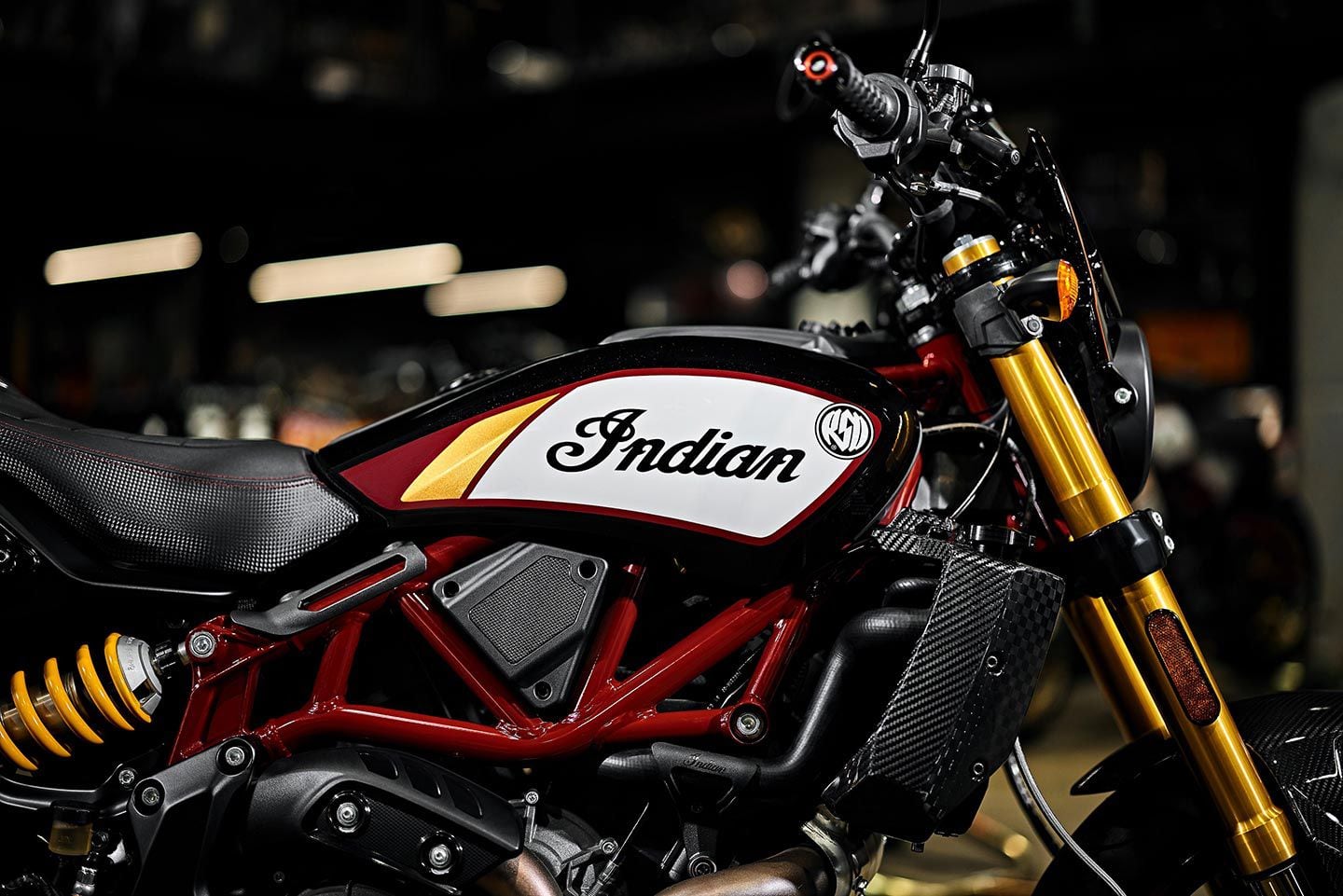 The FTR x RSD’s tank gets the Indian race team colors and is set off by carbon-fiber-ish accents.