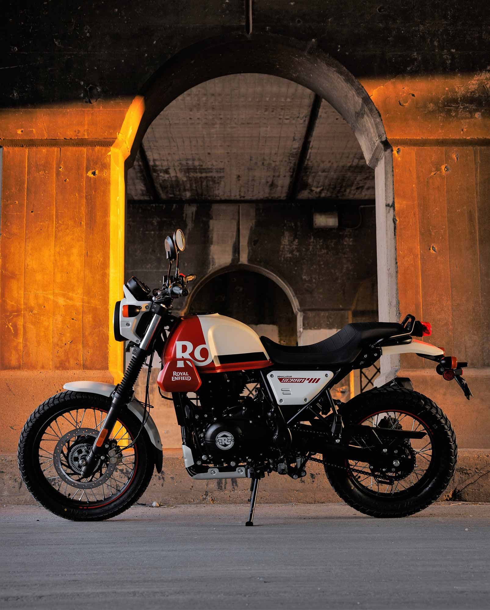 A single-piece scrambler seat also differentiates the Scram, along with a new headlight cowling and redesigned side panels. Handlebars are also positioned lower and a bit farther back.