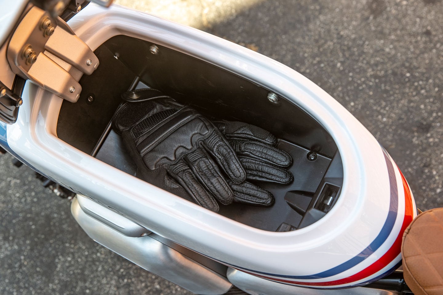 Got storage? The faux tank on the RM1S offers 2.6 gallons of open space for personal items or for carrying the battery charger.