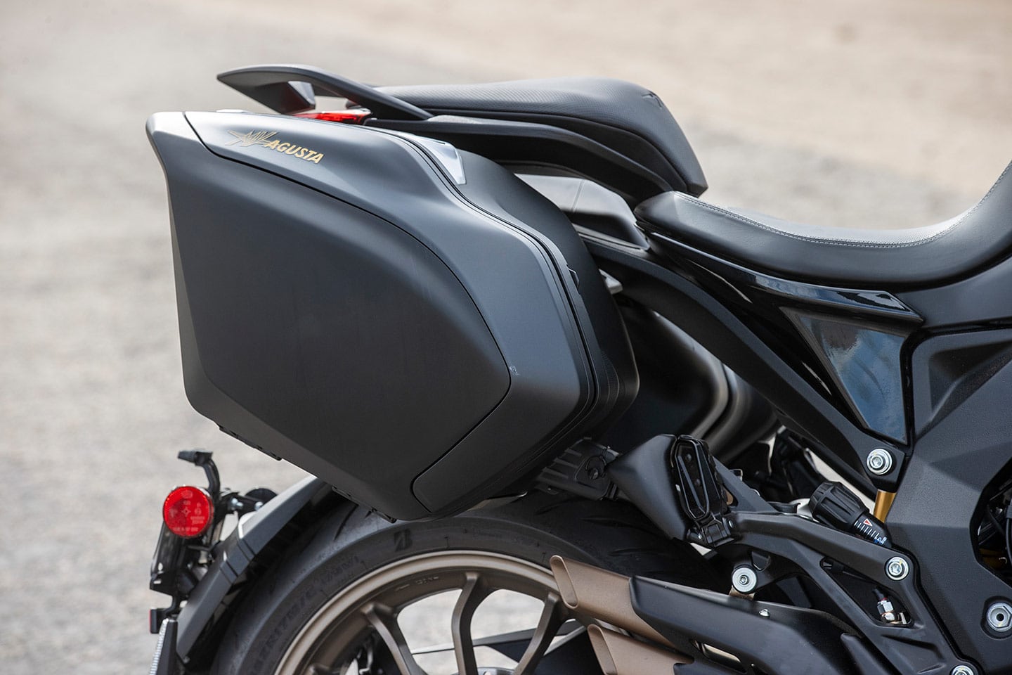 The Turismo Veloce’s passenger seat is uniquely split from the passenger seat, adding a stylish flair and getting the pillion up above the rider.