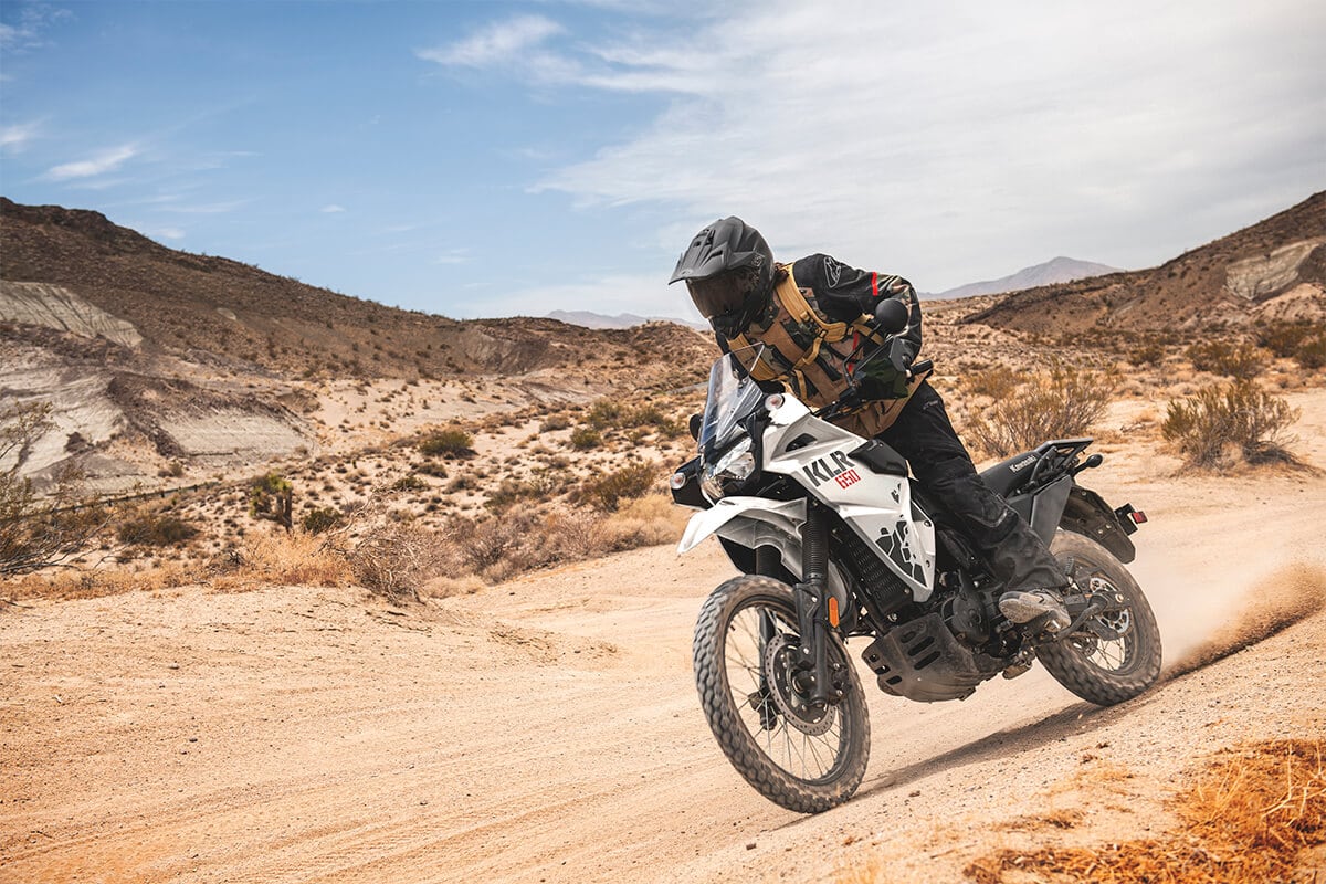 Equipped with off-road components, the KLR650 is at home in the dirt.