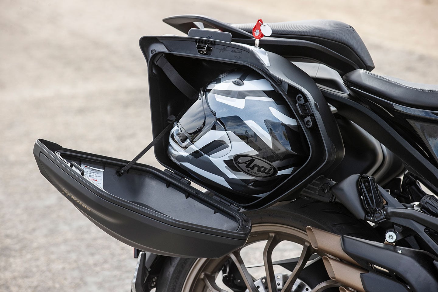 The 34-liter side bags fit a full-face helmet and are quite impressive in terms of their storage ability. Fit and finish is a touch less impressive.