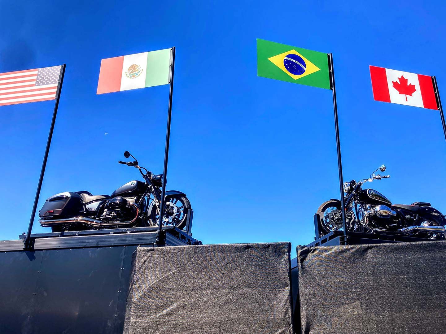 A BMW R 18 Roctane and R 18 100 Years edition watch over the BMW Motorrad Days Fun Zone at Barber Motorsports Park.